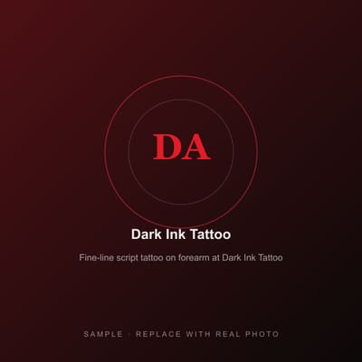 Fine-line script tattoo on forearm at Dark Ink Tattoo